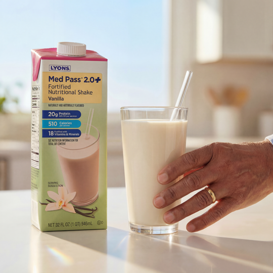 Lyons Med Pass 2.0+ fortified nutritional shake with a glass of milk on a countertop.