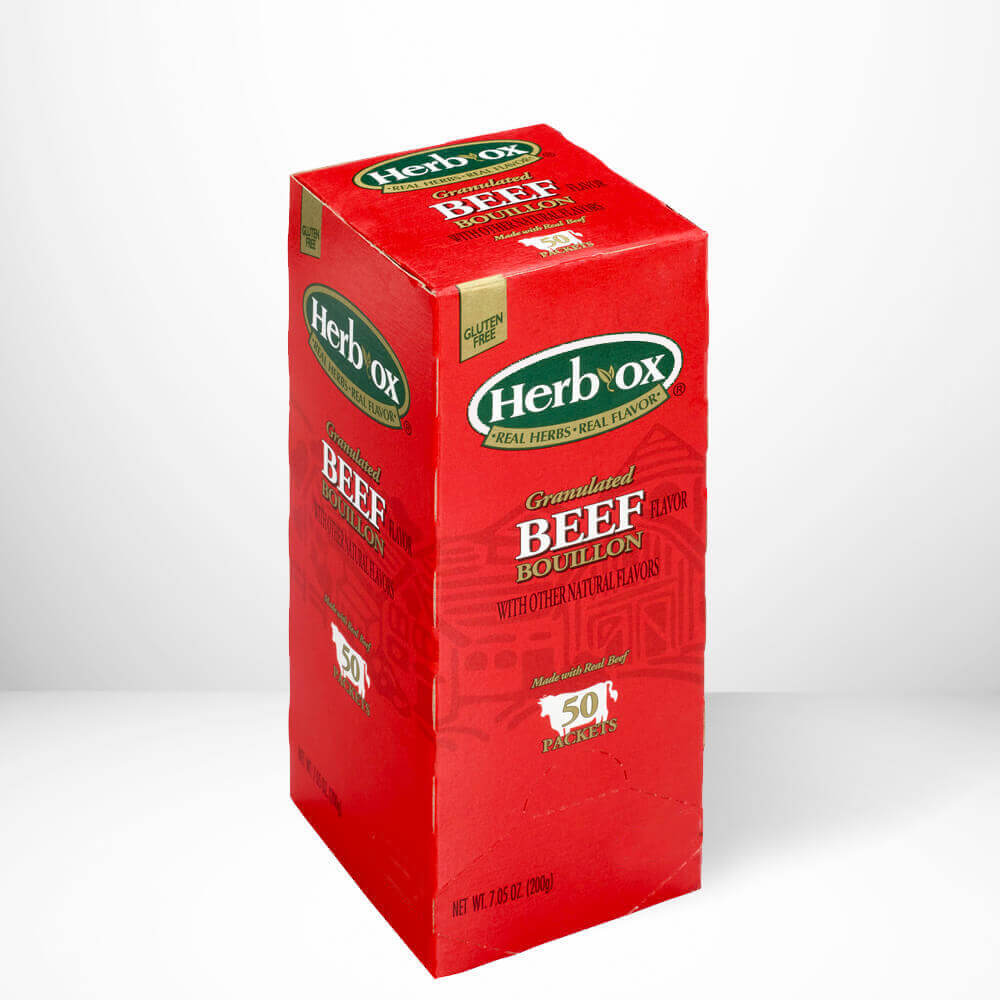 Red box of Herb-Ox Grounded Beef Bouillon on a white background.
