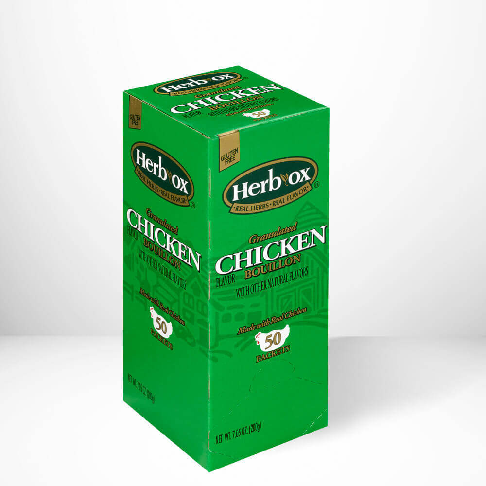 Green box of Herb ox Chicken bouillon on a white background.